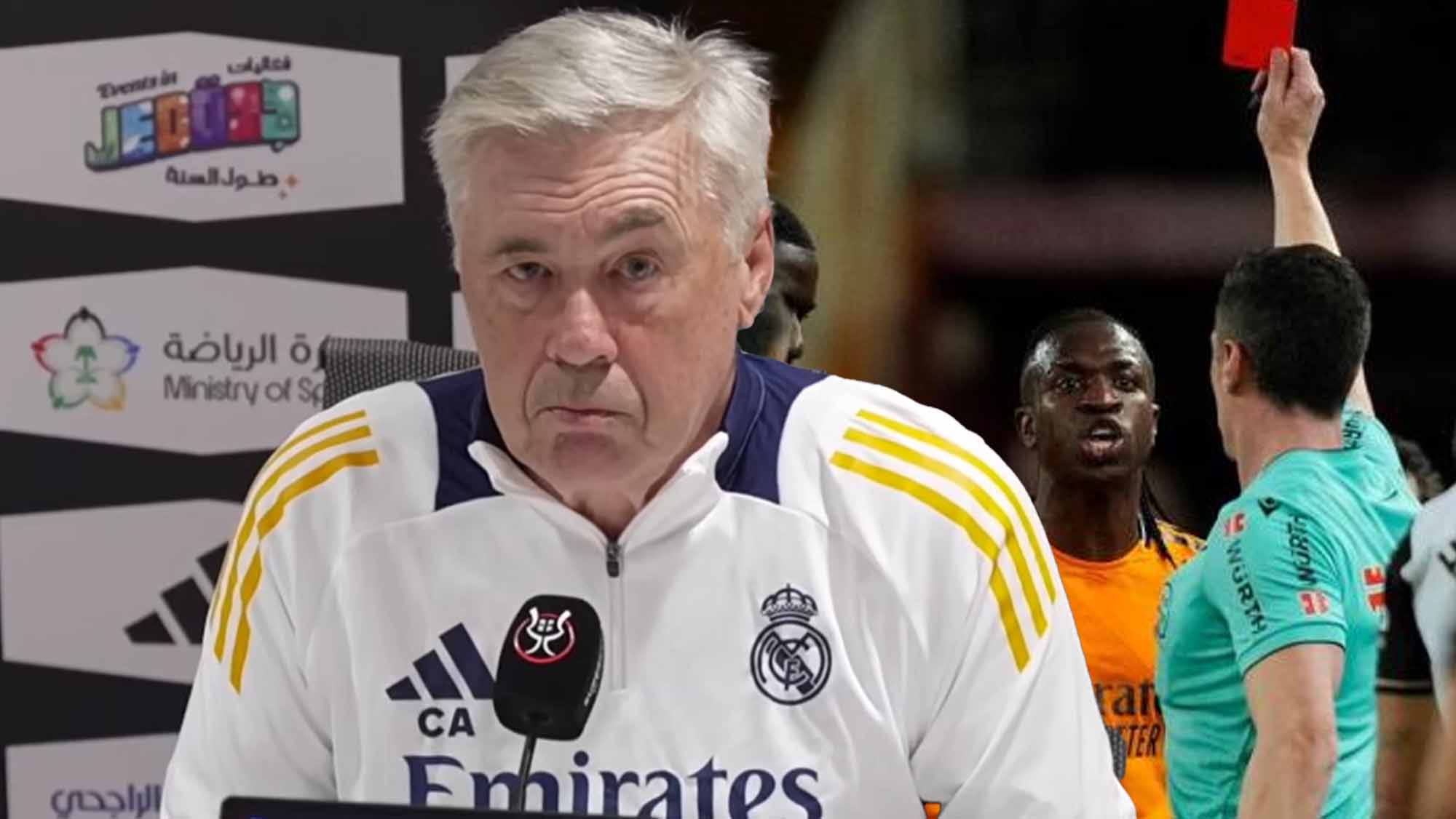 Carlo serio en rueda de prensa con roja a Vinicius